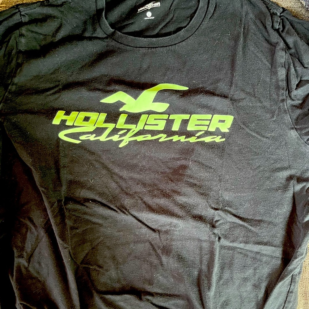 Hollister Large Short Sleeved T-Shirt with Glow-in-The-Dark logo.